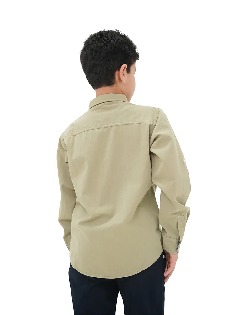 Chemise unie manches longues